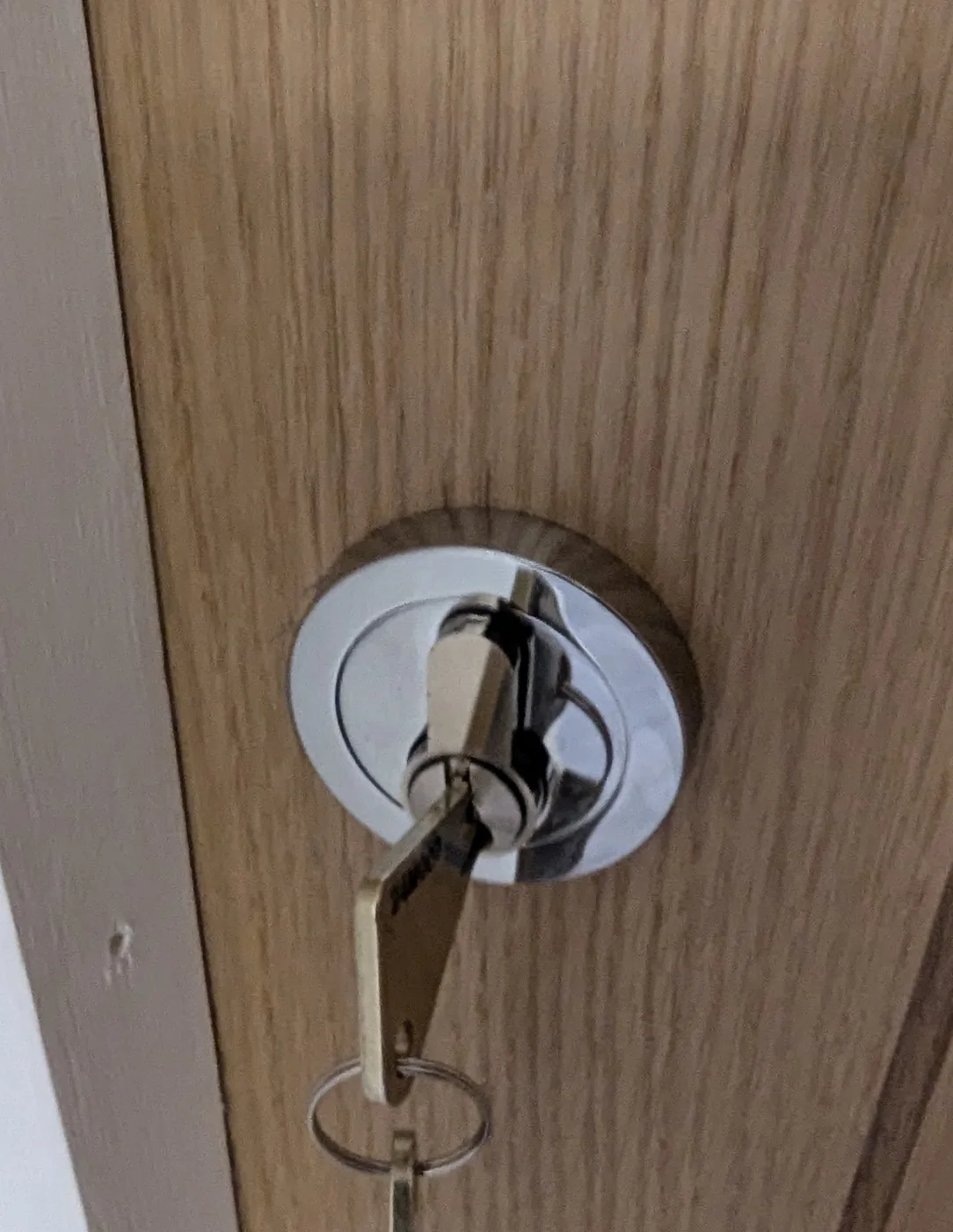 Internal access lock fitted to a timber-style door for key-controlled access